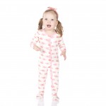 Print Ruffle Footie in Girl Cowfish